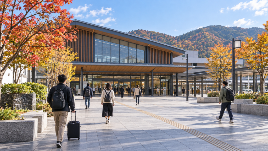 駅前広場を歩く旅行者を描いた生成イメージ